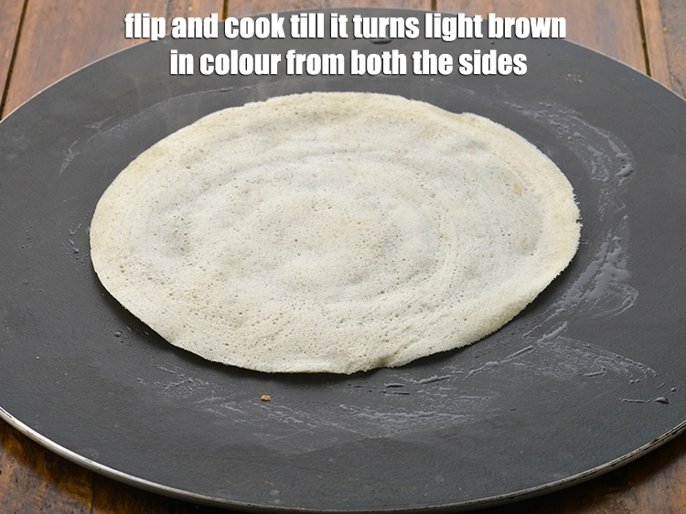 Step 22 – <p>Flip and cook till it turns light brown in colour from both the sides.</p>