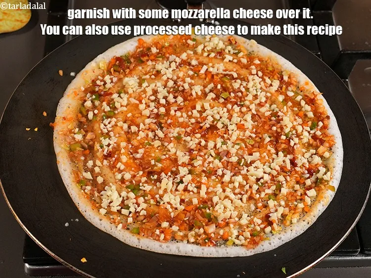 Step 13 – <p>Garnish with some <a href="https://www.tarladalal.com/glossary-mozzarella-cheese-311i#ing_3218"><u>diced mozzarella cheese</u></a> over it. You can also use processed cheese …