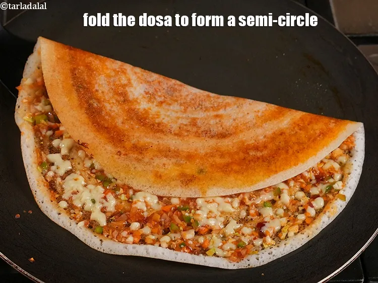 Step 15 – <p>Fold the dosa to form a semi-circle. Repeat steps 1 to 6 to make 5 …