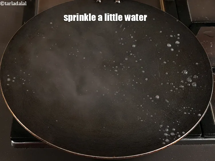 Step 4 – <p>Sprinkle a little water.</p>