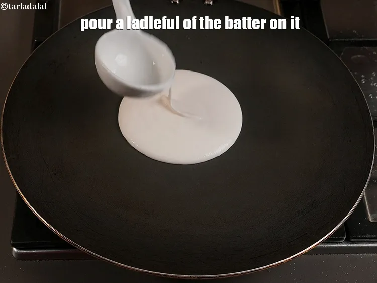 Step 6 – <p>Pour a ladleful of the batter on it.</p>