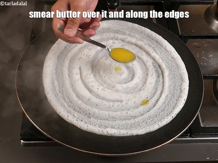 Step 8 – <p>Smear 1 tsp butter over it and along the edges.</p>