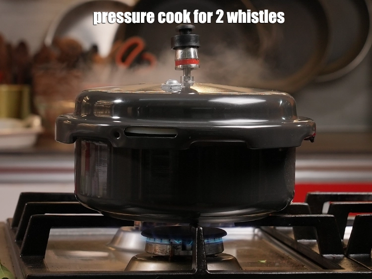 Step 14 – <p><span style="background-color:rgb(255,255,255);color:rgb(0,0,0);">Pressure cook for 2 whistles.</span></p>