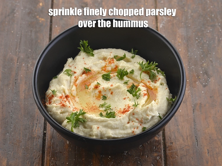 Step 25 – <p><span style="background-color:rgb(255,255,255);color:rgb(0,0,0);">Now sprinkle finely chopped parsley over the </span><strong>hummus.</strong></p>