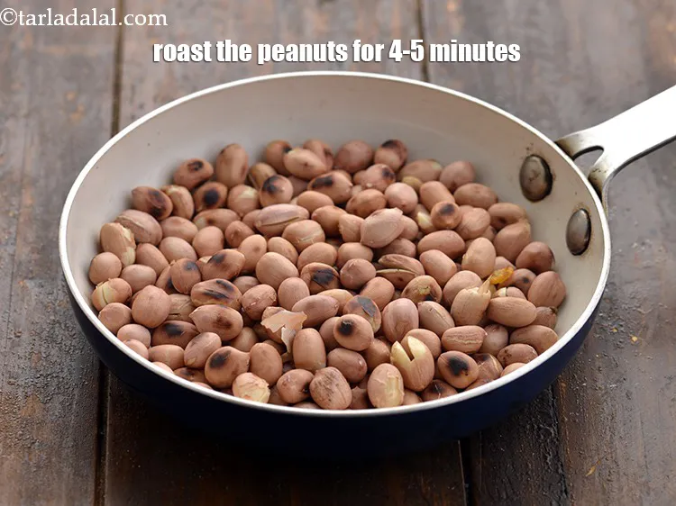 Step 5 – <html><head></head><body><p>Roast the peanuts on a medium flame for 4-5 minutes, while stirring occasionally.&nbsp;The peanuts should …