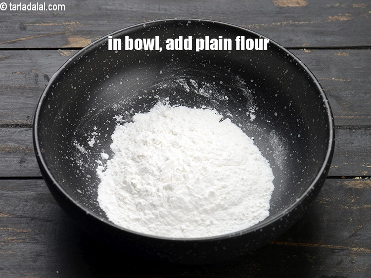 Step 1 – <p><span style="background-color:rgb(255,255,255);color:rgb(0,0,0);">In a bowl, add 1/4 cup </span><a href="https://www.tarladalal.com/glossary-plain-flour-maida-188i"><u>plain flour (maida)</u></a><u>.</u></p>