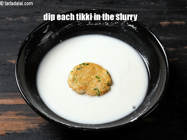 Step 11 – <p><span style="background-color:rgb(255,255,255);color:rgb(0,0,0);">Roll each cutlet in the plain flour-water mixture.</span></p>