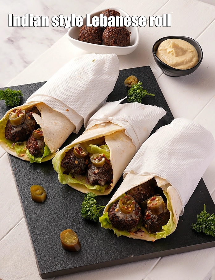 Step 35 – <p><span style="background-color:rgb(255,255,255);color:rgb(0,0,0);">Wrap a tissue paper around each roll and serve </span><strong>Lebanese vegetarian wrap | &nbsp;Indian …