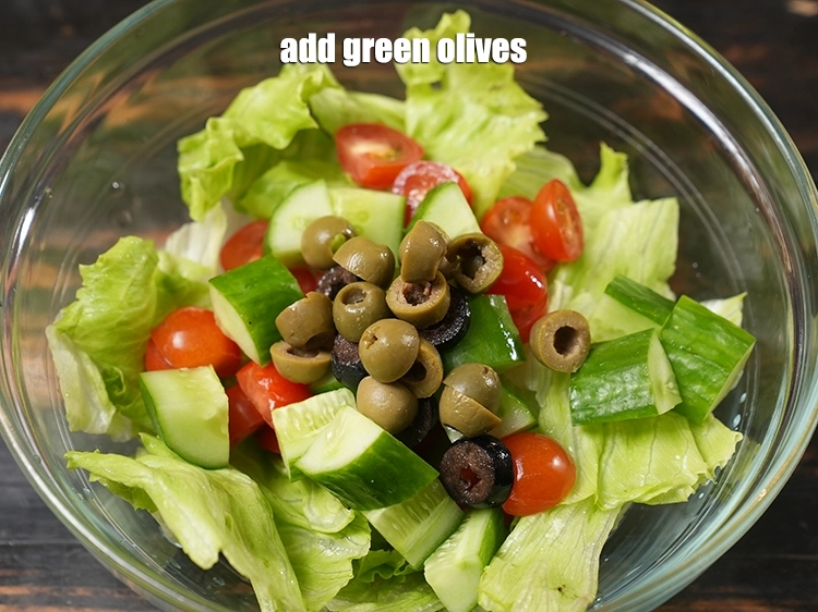 Step 13 – <p><span style="background-color:rgb(255,255,255);color:rgb(0,0,0);">Add 5 green </span><a href="https://www.tarladalal.com/glossary-olives-448i"><u>olives</u></a><u>.</u></p>