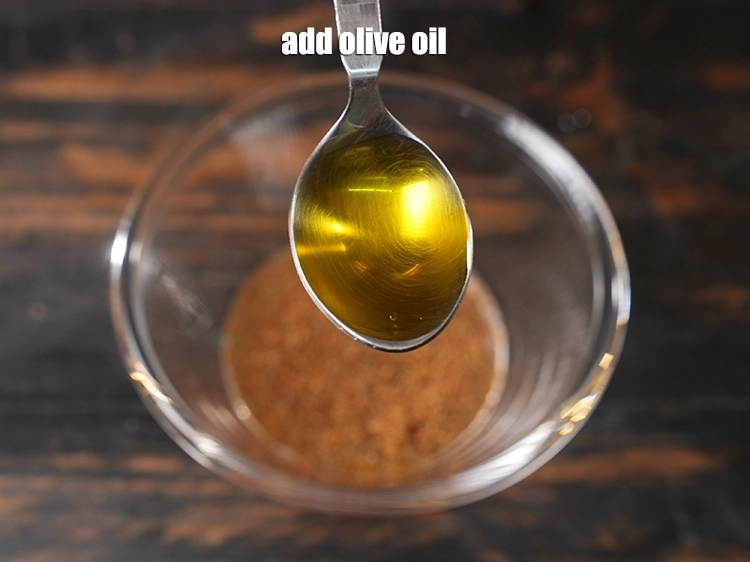 Step 7 – <p>Add <span style="background-color:rgb(255,255,255);color:rgb(0,0,0);">2 tsp </span><a href="https://www.tarladalal.com/glossary-olive-oil-451i"><u>olive oil</u></a><u>.</u></p>