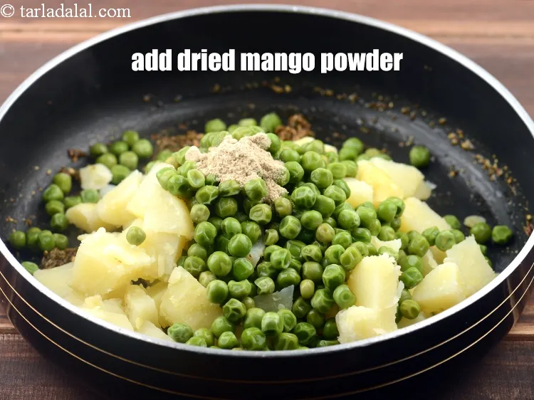 Step 17 – <p><span style="background-color:rgb(255,255,255);color:rgb(0,0,0);">Add 1/4 tsp </span><a href="https://www.tarladalal.com/glossary-dried-mango-powder-amchur-powder-148i"><u>dried mango powder (amchur)</u></a><u>.</u></p>