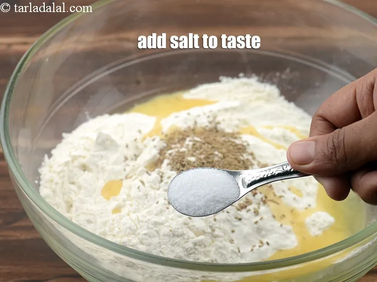 Step 4 – <p><span style="background-color:rgb(255,255,255);color:rgb(0,0,0);">Add </span><a href="https://www.tarladalal.com/glossary-salt-namak-table-salt-418i"><u>salt </u></a><span style="background-color:rgb(255,255,255);color:rgb(0,0,0);">to taste.</span></p>