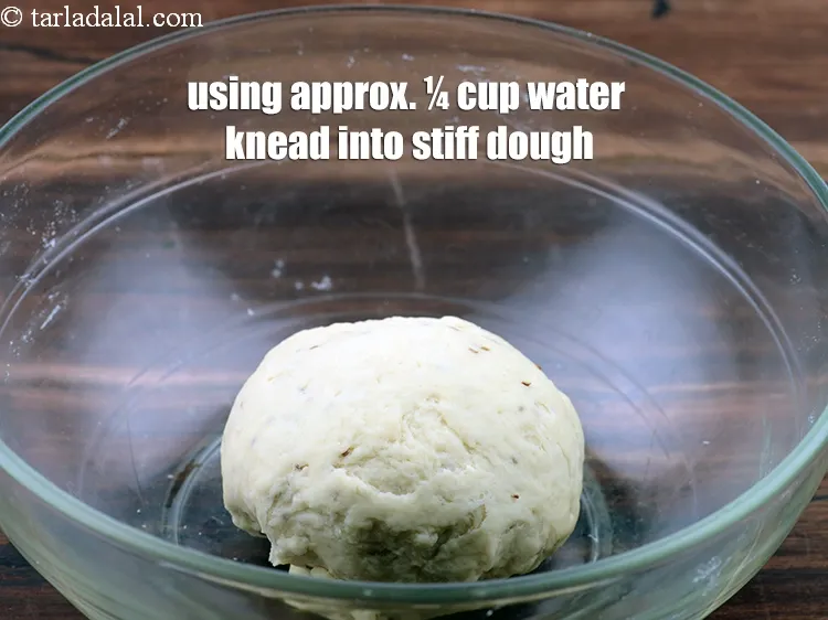 Step 6 – <p><span style="background-color:rgb(255,255,255);color:rgb(0,0,0);">Using using enough water knead into a stiff dough.</span></p>