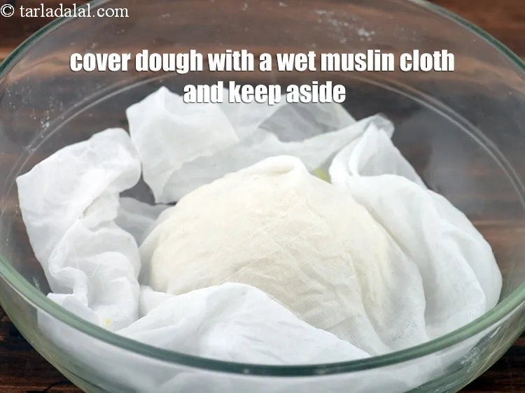 Step 7 – <p><span style="background-color:rgb(255,255,255);color:rgb(0,0,0);">Cover the dough with a wet muslin cloth and keep aside for 5 minutes.</span></p>