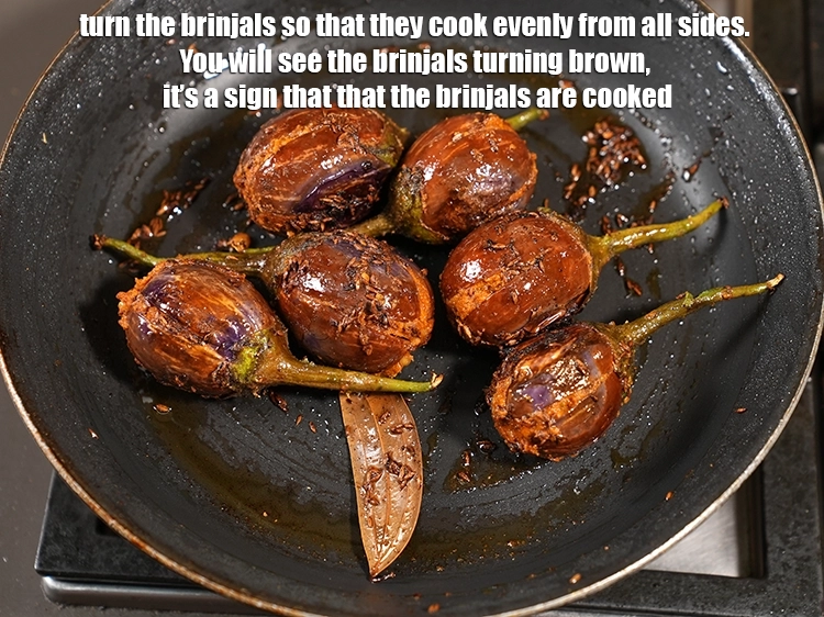 Step 43 – <p><span style="background-color:rgb(255,255,255);color:rgb(0,0,0);">Turn the brinjals so that they cook evenly from all sides. You will see …