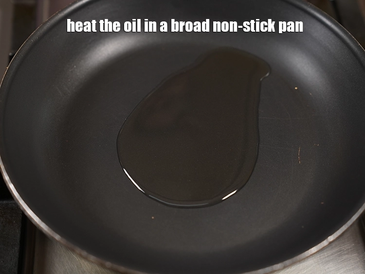 Step 10 – <p>Heat the <a href="https://www.tarladalal.com/glossary-oil-671i"><u>oil</u></a> in a broad non-stick pan.</p>