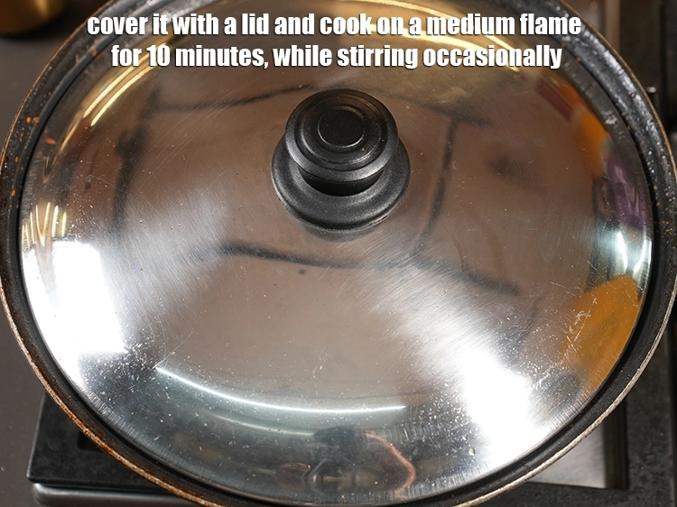 Step 48 – <p><span style="background-color:rgb(255,255,255);color:rgb(0,0,0);">Cover it with a lid and cook on a medium flame for 10 minutes, …