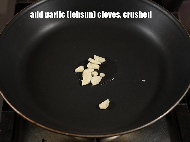 Step 3 – <p>Add <span style="background-color:rgb(255,255,255);color:rgb(0,0,0);">6 to 7 </span><a href="https://www.tarladalal.com/glossary-garlic-lehsun-lahsun-348i#ing_2537"><u>garlic (lehsun) cloves </u></a><span style="background-color:rgb(255,255,255);color:rgb(0,0,0);">, crushed.</span></p>