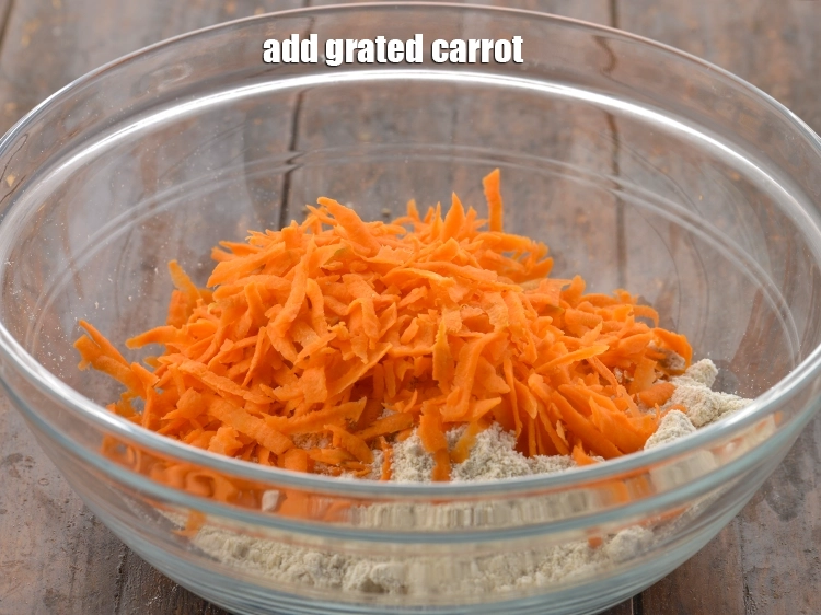 Step 5 – <p>Add the <span style="background-color:rgb(255,255,255);color:rgb(0,0,0);">1/2 cup </span><a href="https://www.tarladalal.com/glossary-carrot-gajar-gajjar-253i#ing_2385"><u>grated carrot</u></a>. You can even add grated beetroot.</p>