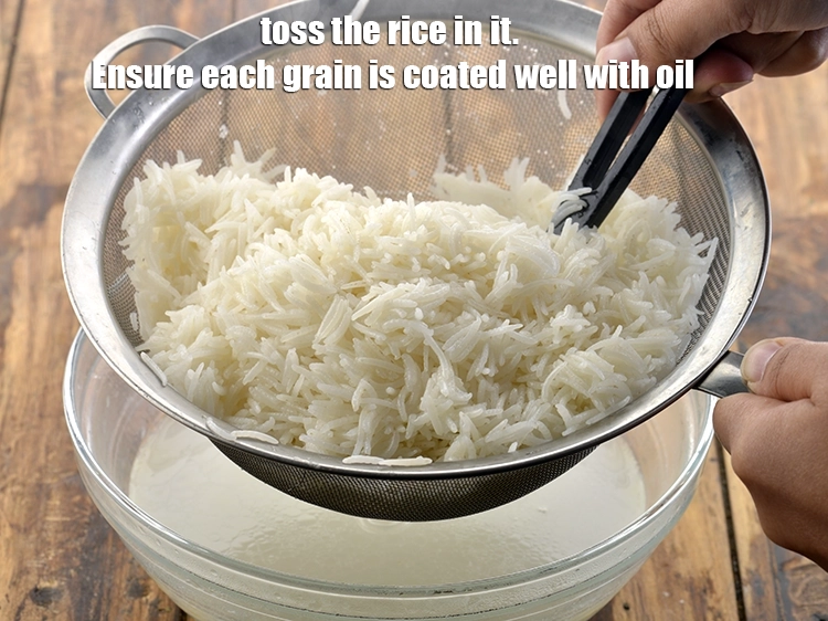 Step 12 – <p>Toss the rice in it. Ensure each grain is coated well with oil.</p>