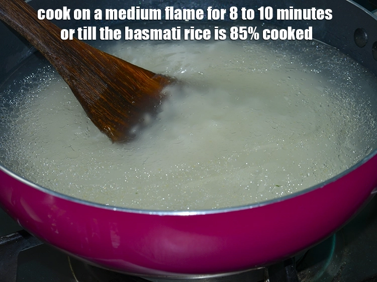 Step 8 – <p>Cook on a medium flame for 8 to 10 minutes or till the&nbsp;<strong>basmati rice</strong>&nbsp;is 85% …