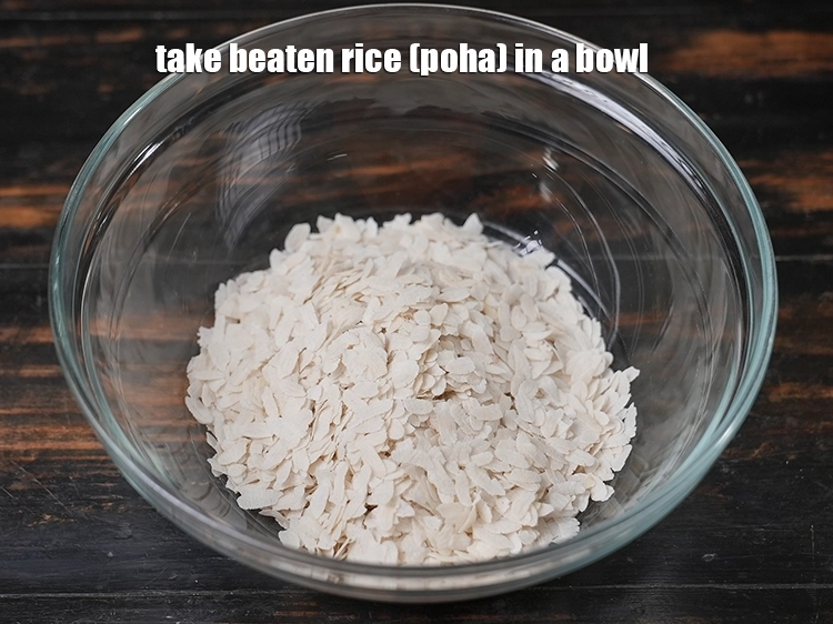 Step 7 – <p>Take <span style="background-color:rgb(255,255,255);color:rgb(0,0,0);">1 cup </span><a href="https://www.tarladalal.com/glossary-beaten-rice-poha-rice-flakes-flaked-rice-536i"><u>beaten rice (poha)</u></a> in a bowl.</p>