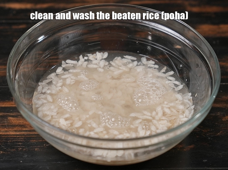 Step 8 – <p><span style="background-color:rgb(255,255,255);color:rgb(0,0,0);">Clean and wash the &nbsp;</span><a href="https://www.tarladalal.com/glossary-beaten-rice-poha-rice-flakes-flaked-rice-536i"><u>beaten rice (poha)</u></a><u>.</u></p>