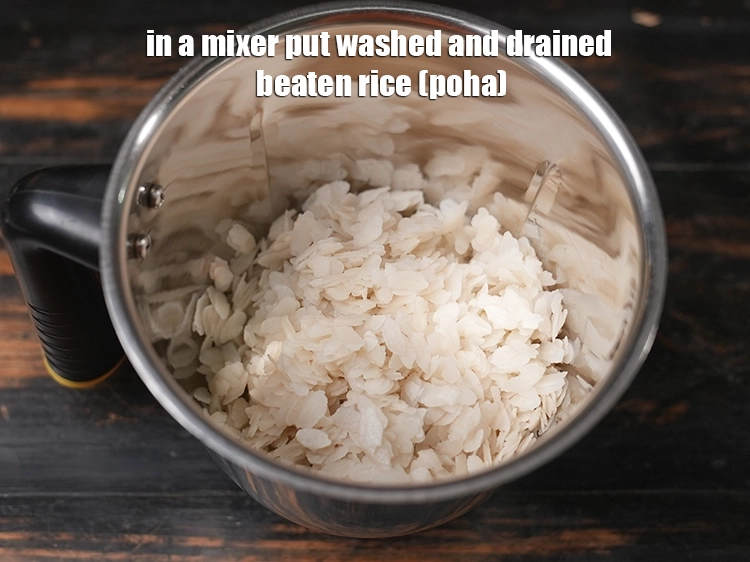 Step 10 – <p><span style="background-color:rgb(255,255,255);color:rgb(0,0,0);">Transfer the washed and drained </span><a href="https://www.tarladalal.com/glossary-beaten-rice-poha-rice-flakes-flaked-rice-536i"><u>beaten rice (poha)</u></a><span style="background-color:rgb(255,255,255);color:rgb(0,0,0);"> into a mixer jar.</span></p>