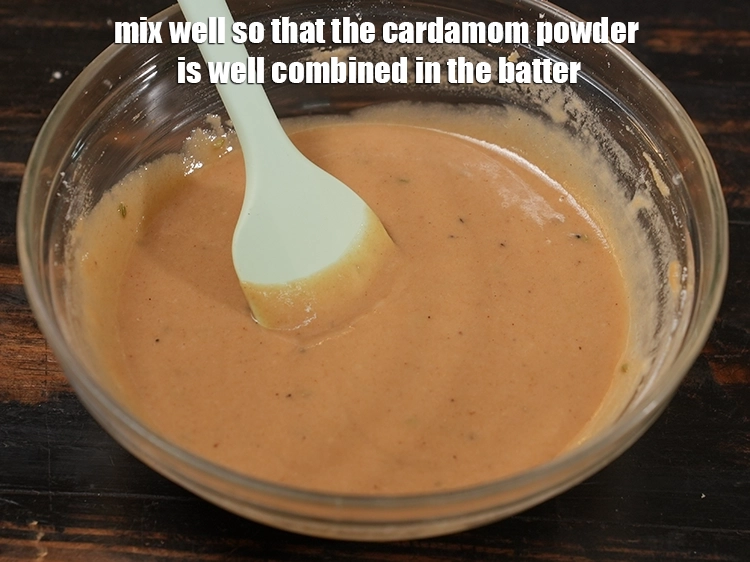 Step 11 – <p>Mix well so that the cardamom powder is well combined in the batter. We will …