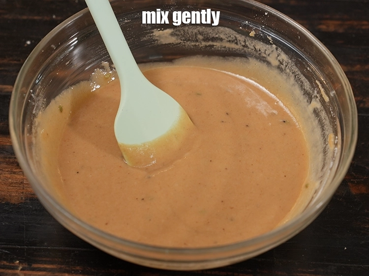 Step 14 – <p>Mix gently. Remember the word gently and slowly as the batter has fruit salt in …