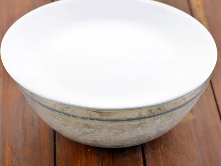 Step 5 – <p>Cover with a lid and keep aside for 30 minutes. This idli can be prepared …