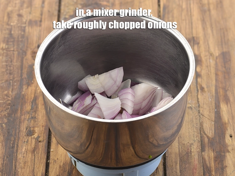 Step 1 – <p>In a mixer grinder, take <span style="background-color:rgb(255,255,255);color:rgb(0,0,0);">1/4 cup roughly </span><a href="https://www.tarladalal.com/glossary-onions-pyaz-pyaaz-kanda-548i#ing_2327"><u>chopped onion</u></a>.</p>