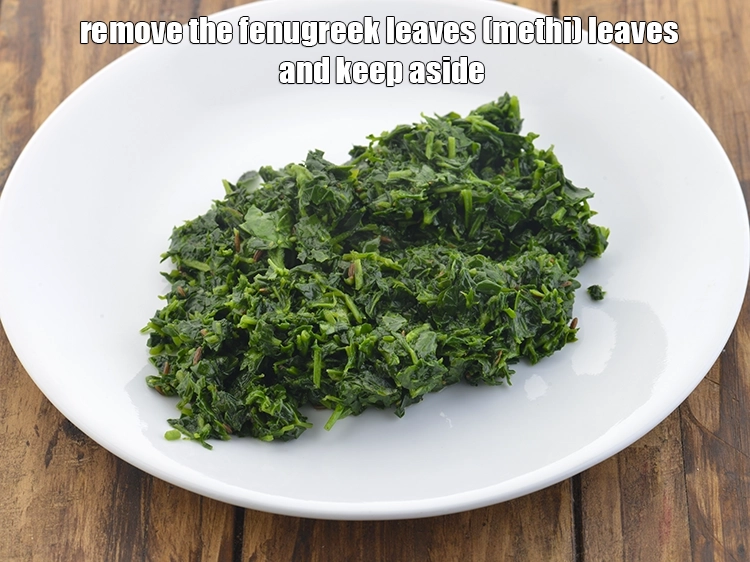 Step 23 – <p>Remove the <a href="https://www.tarladalal.com/glossary-fenugreek-leaves-methi-methi-leaves-methi-ke-patte-methi-ki-bhaji-373i#ing_2382"><u>fenugreek leaves (methi) </u></a><span style="background-color:rgb(255,255,255);color:rgb(0,0,0);">leaves</span> and keep aside.</p>