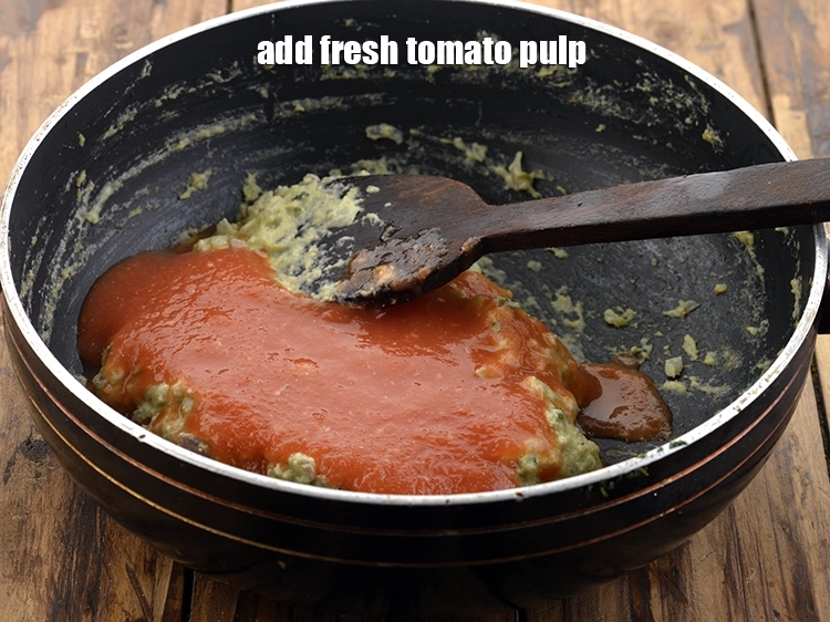 Step 27 – <p>Add the <span style="background-color:rgb(255,255,255);color:rgb(0,0,0);">1/2 cup fresh </span><a href="https://www.tarladalal.com/glossary-tomatoes-tamatar-639i#ing_2756"><u>tomato pulp</u></a>. Here is a <a href="/Fresh-Tomato-Pulp-22788r">detailed recipe …