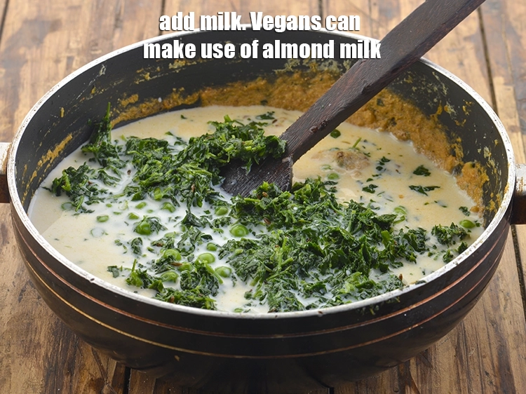 Step 32 – <p>Add the <span style="background-color:rgb(255,255,255);color:rgb(0,0,0);">1 1/4 cups </span><a href="https://www.tarladalal.com/glossary-milk-doodh-full-cream-milk-514i"><u>milk</u></a>. Vegans can make use of almond milk.</p>