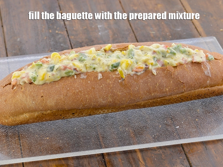Step 7 – <p><span style="background-color:rgb(255,255,255);color:rgb(0,0,0);">Fill the baguette with the <strong>prepared mixture</strong>.</span></p>