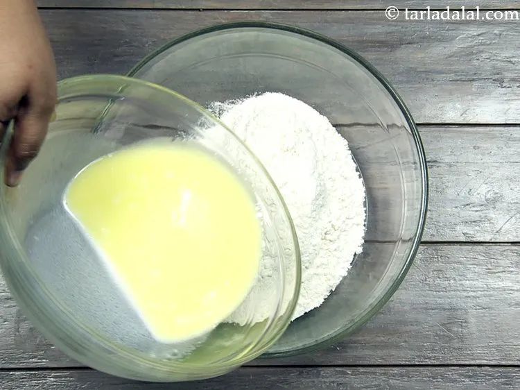 Step 17 – <p>Add the <strong>prepared butter-milk mixture</strong> into it.</p>