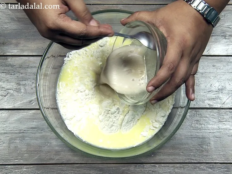 Step 18 – <p>Add the <strong>prepared yeast-sugar mixture</strong>.</p>