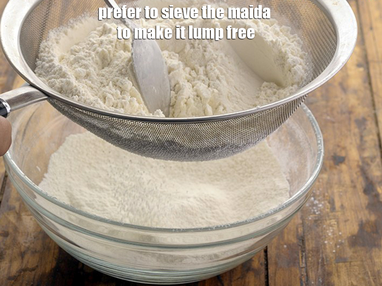 Step 35 – <p><span style="background-color:rgb(255,255,255);color:rgb(0,0,0);">Prefer to sieve the </span><a href="https://www.tarladalal.com/glossary-plain-flour-maida-188i"><u>plain flour (maida)</u></a><span style="background-color:rgb(255,255,255);color:rgb(0,0,0);"> to make it lump free.</span></p>