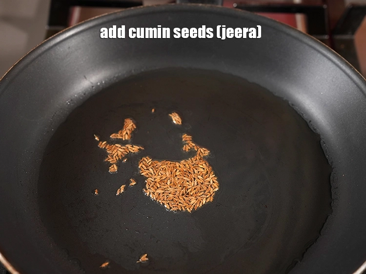 Step 23 – <p>Add <span style="background-color:rgb(255,255,255);color:rgb(0,0,0);">1/2 tsp </span><a href="https://www.tarladalal.com/glossary-cumin-seeds-jeera-zeera-381i"><u>cumin seeds (jeera)</u></a><u>.</u></p>