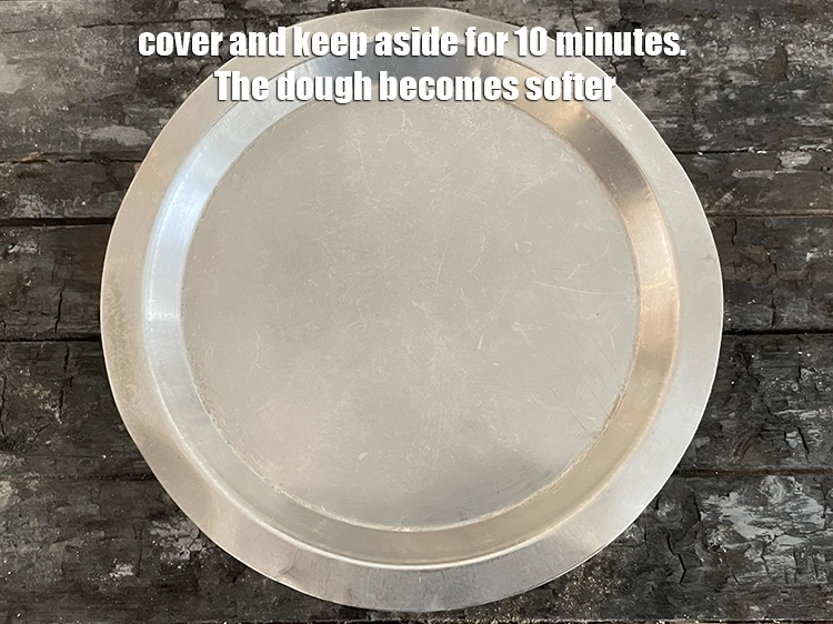 Step 7 – <p>Cover and&nbsp;keep aside for 10 minutes. The dough becomes softer.</p>