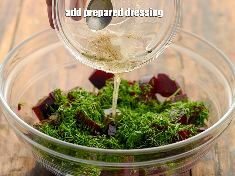 Step 18 – <p><span style="background-color:rgb(255,255,255);color:rgb(0,0,0);">Add the <strong>prepared dressing.</strong></span></p>