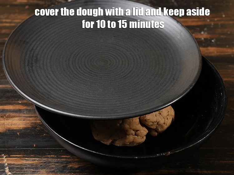 Step 11 – <p><span style="background-color:rgb(255,255,255);color:rgb(51,51,51);">Cover and allow the dough to rest for 15 or 20 minutes.</span></p>