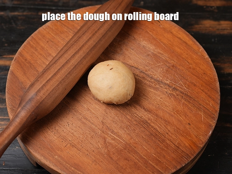 Step 13 – <p><span style="background-color:rgb(255,255,255);color:rgb(51,51,51);">Place the dough on rolling board.</span></p>