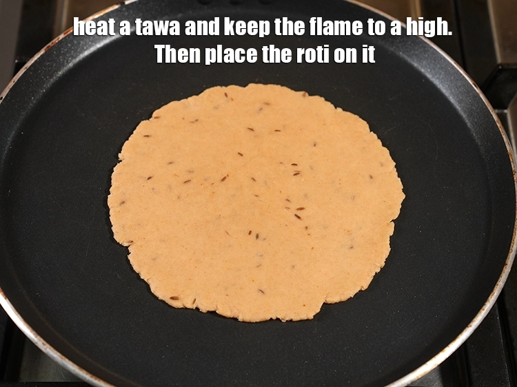 Step 15 – <p><span style="background-color:rgb(255,255,255);color:rgb(51,51,51);">Heat a tawa and keep the flame to a high. Then place the roti …