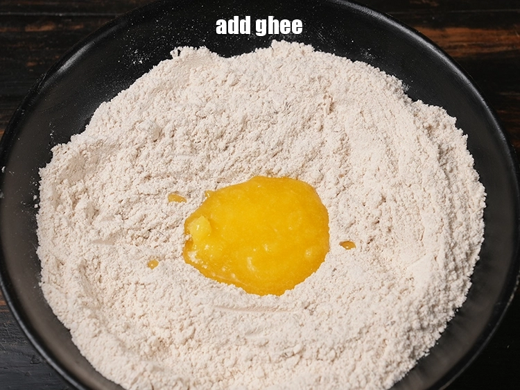 Step 6 – <p>Add add <a href="https://www.tarladalal.com/glossary-ghee-245i">ghee</a>.</p>