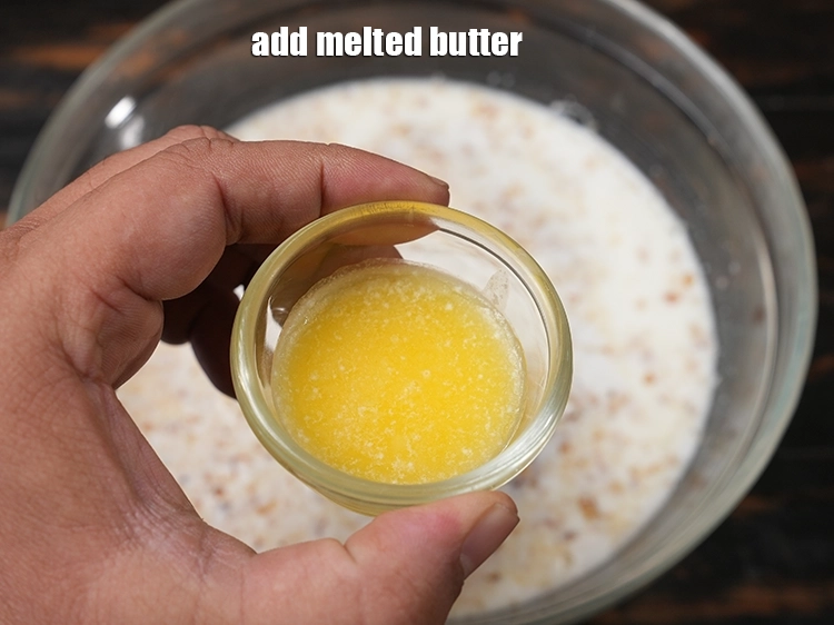 Step 9 – <p>Add <span style="background-color:rgb(255,255,255);color:rgb(0,0,0);">1 tbsp </span><a href="https://www.tarladalal.com/glossary-butter-makhan-233i#ing_3123"><u>melted butter</u></a><u>.</u></p>