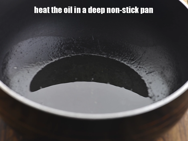 Step 21 – <p>For making the <strong>Sambar</strong> recipe, heat the <span style="background-color:rgb(255,255,255);color:rgb(0,0,0);">2 tbsp </span><a href="https://www.tarladalal.com/glossary-oil-671i"><u>oil</u></a> in a deep …
