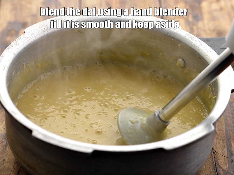 Step 14 – <p><span style="background-color:rgb(255,255,255);color:rgb(0,0,0);">Blend the dal using a hand blender till it is smooth and keep aside. …