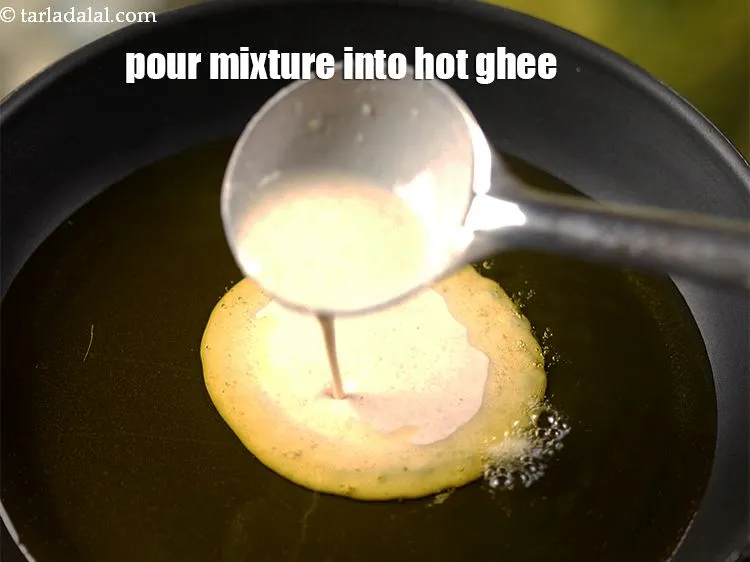 Step 26 – <p>To get perfectly round and crispy malpuas, make sure the ghee is piping hot before …